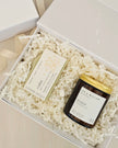 Candle and card in a gift box with 'Jewel Ivy & Willow' branding