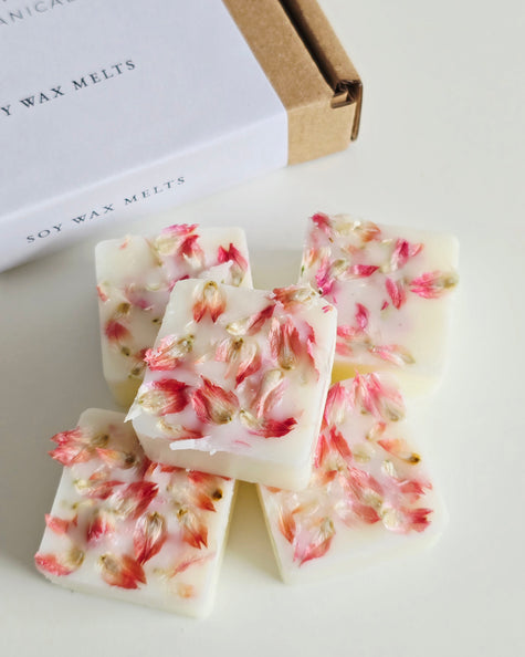 Soy wax melts with floral design on a white surface