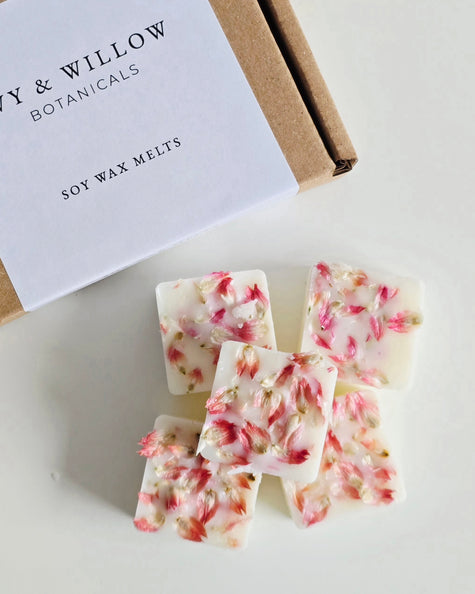 Floral soy wax melts with a branded box on a white background