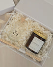 Candle and diffuser set in a gift box with 'Ivy & Willow' branding.