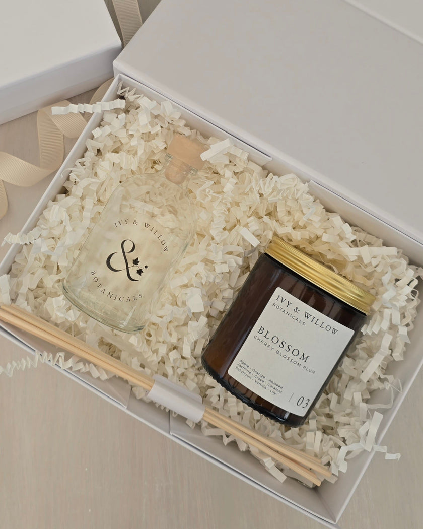 Candle and diffuser set in a gift box with 'Ivy & Willow' branding.