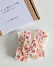 Floral soy wax melts with a branded box on a white background