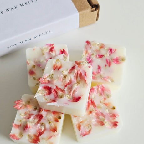 Soy wax melts with floral design on a white surface